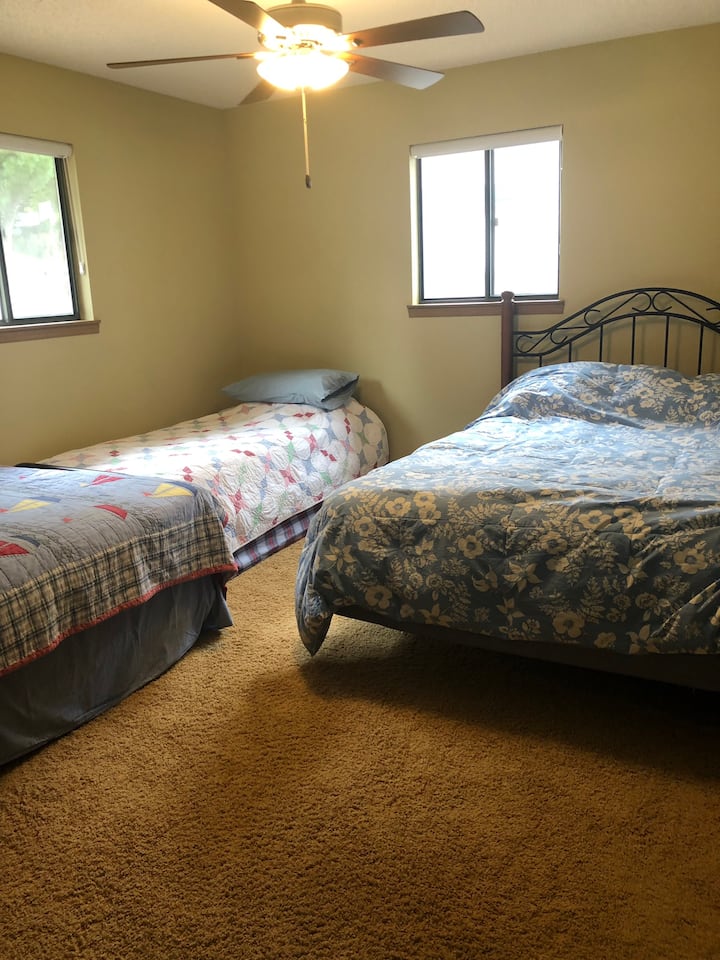 3rd bedroom has a queen, full and twin. Games, books and toys in the closet.