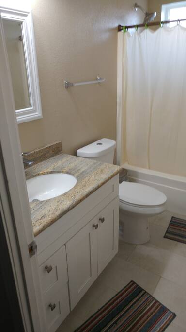 Shared bathroom with one other tenant.