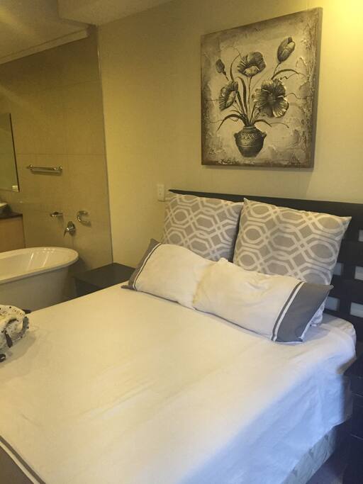Luxurious master suite with open plan full bathroom