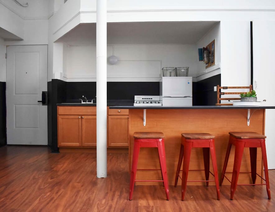 The kitchen is just under the lofted Twin beds