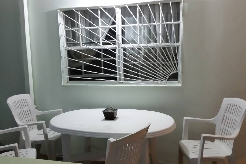 Table and chairs for relaxation outside in the porch overlooking Egmont Bay