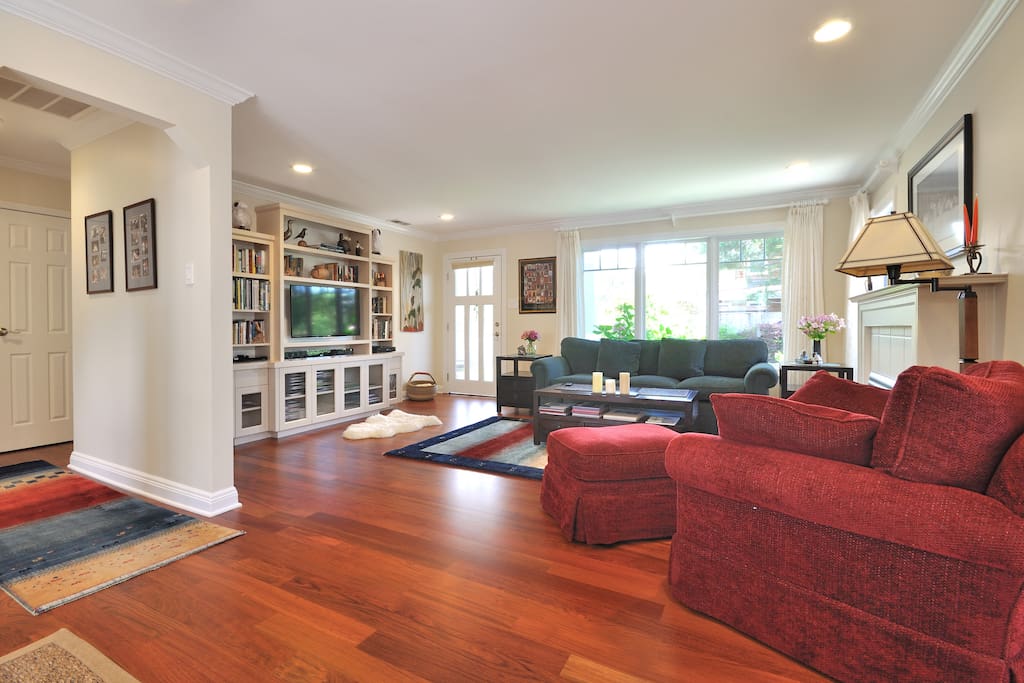Open living and dining room. Lots of natural light and comfortable furniture