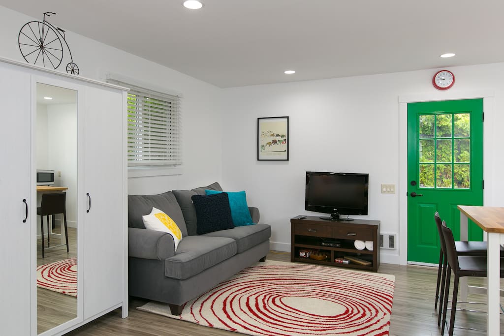 A wardrobe is provided with an extra duvet for the pull out couch, and an ironing board and iron.