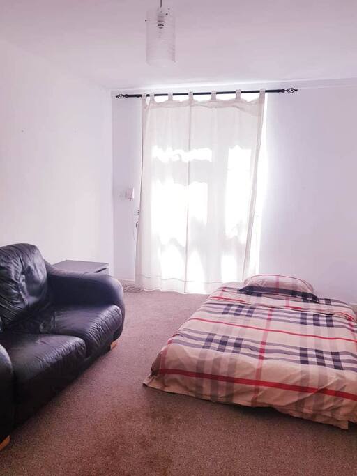 Living room with double air mattress. We also have another single air mattress for the 5th guests