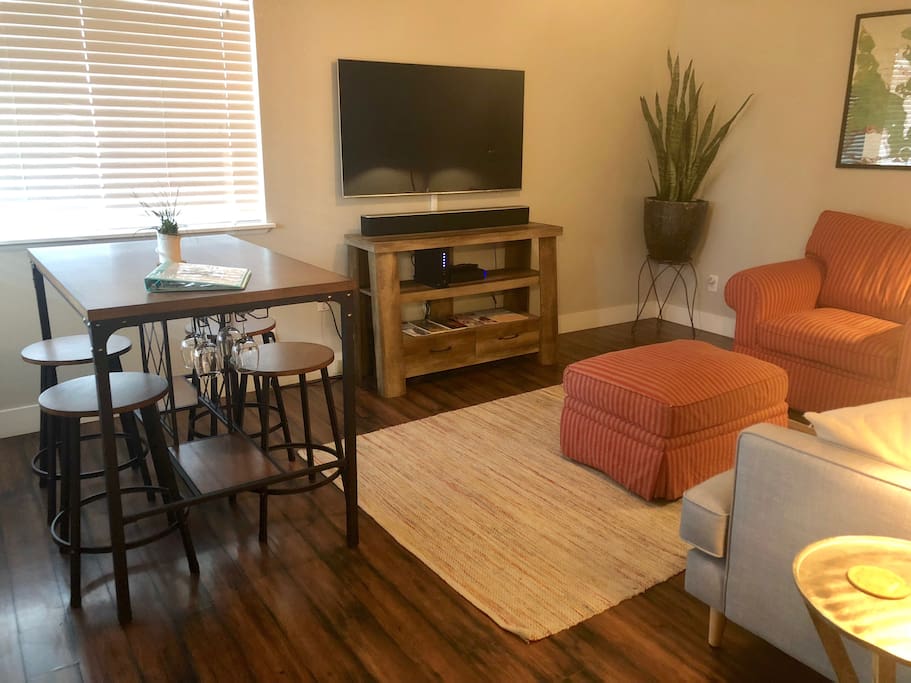 Large Smart TV with Cable. Dining Nook.