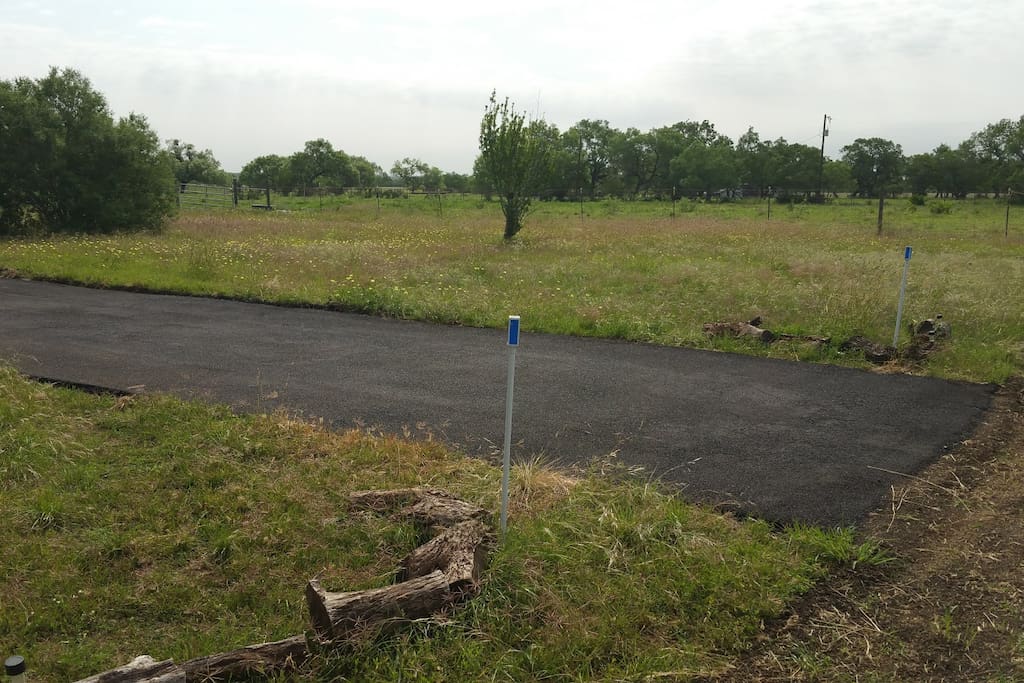 The Southfarthing is the section of lawn adjacent to the highway. It is the largest lot and has a 50 foot paved parking space suitable for larger RV's.