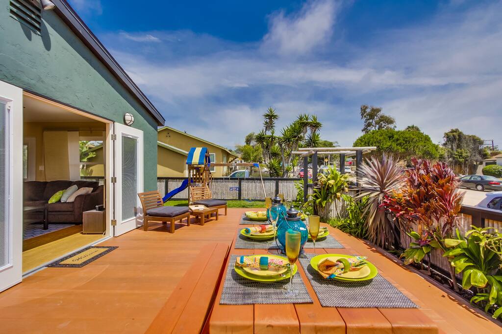 Outdoor dining on large deck. Plastic dinnerware included.