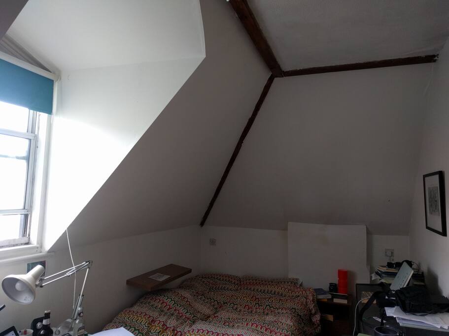 Your double bed, window, electric piano