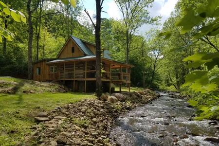 Secluded Log Cabin on the River