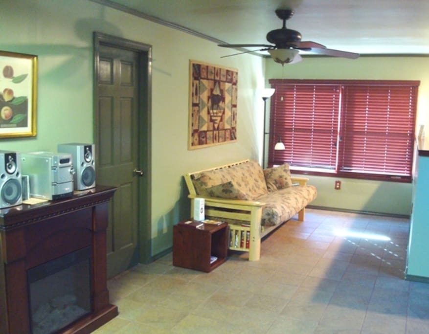 Inner Quest Inn Room sitting area & double pull out futon couch bed
