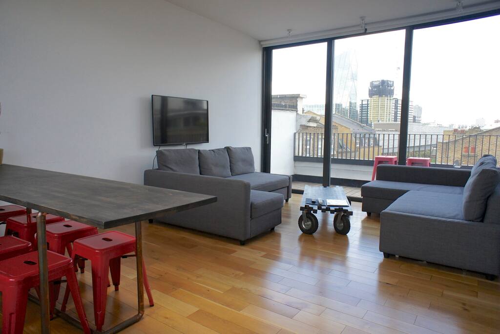 Here's your living room with two double sofa beds