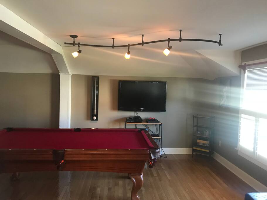 Regulation size pool table and entertainment area with cable tv Xbox One, PlayStation 4, and plenty of movies and games.