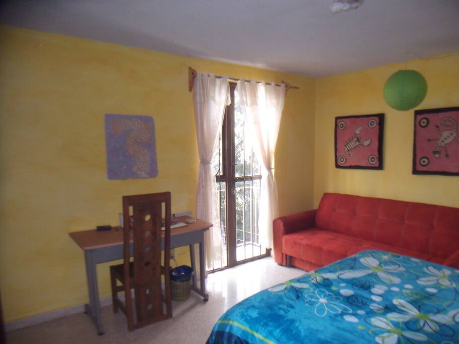 The light from your balcony makes the room warm and inviting. Relax on the couch with a cold drink from your private refrigerator. Beverages are complimentary.