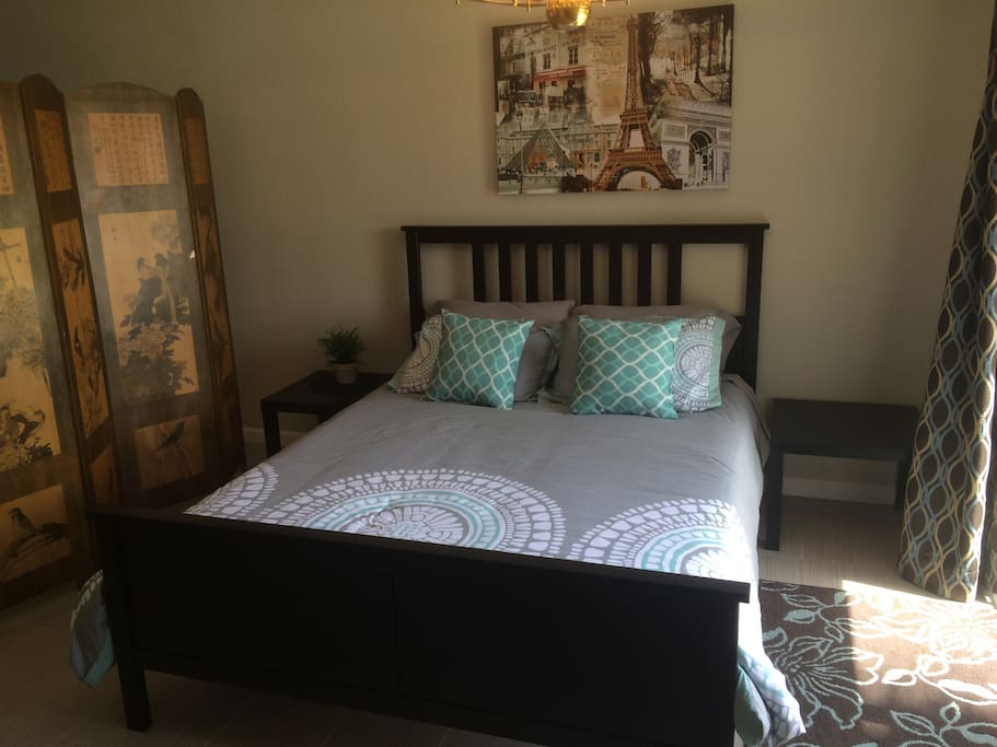 Very comfortable Queen size bed with solid wood bed frame located in the loft area.