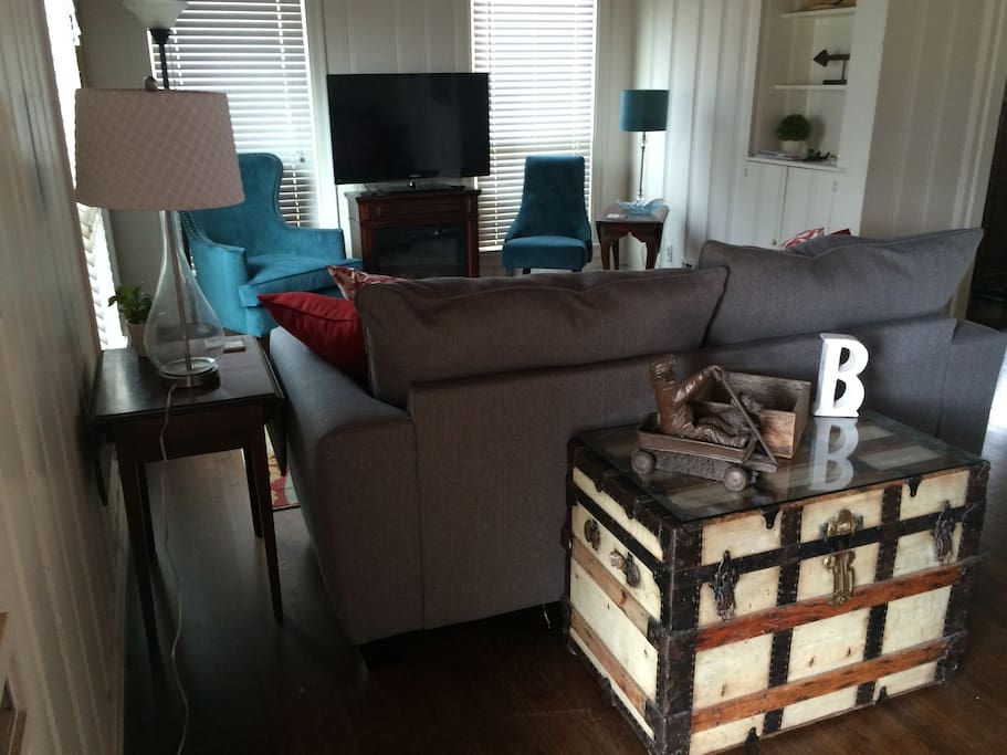 The front living room has lots of light and an electric fireplace