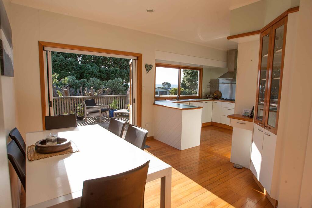 Open plan kitchen which opens to the front deck