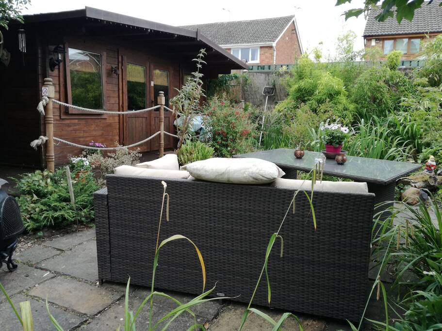 Outdoor seating area outside the lodge, this is where you can smoke .