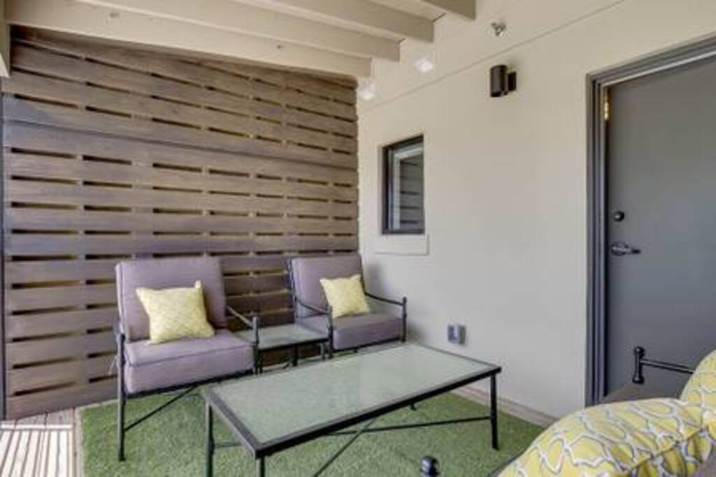 Back patio with seating for 2