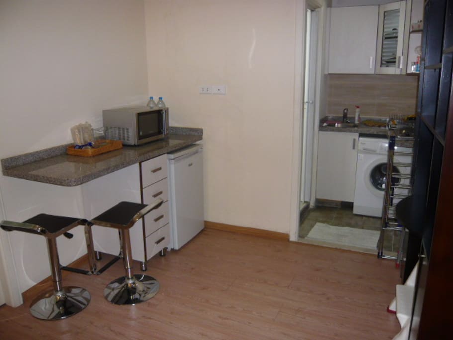 Kitchen fully equipped +bar