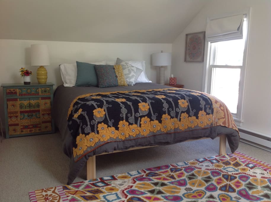 Wonderfully comfortable queen sized bed made with luxurious linens.