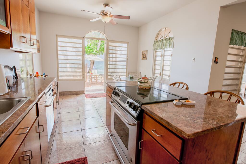 GOURMET KITCHEN WITH EVERYTHING YOU NEED- CUSTOM MAHOGANY CABINETS WITH IMPORTED GRANITE