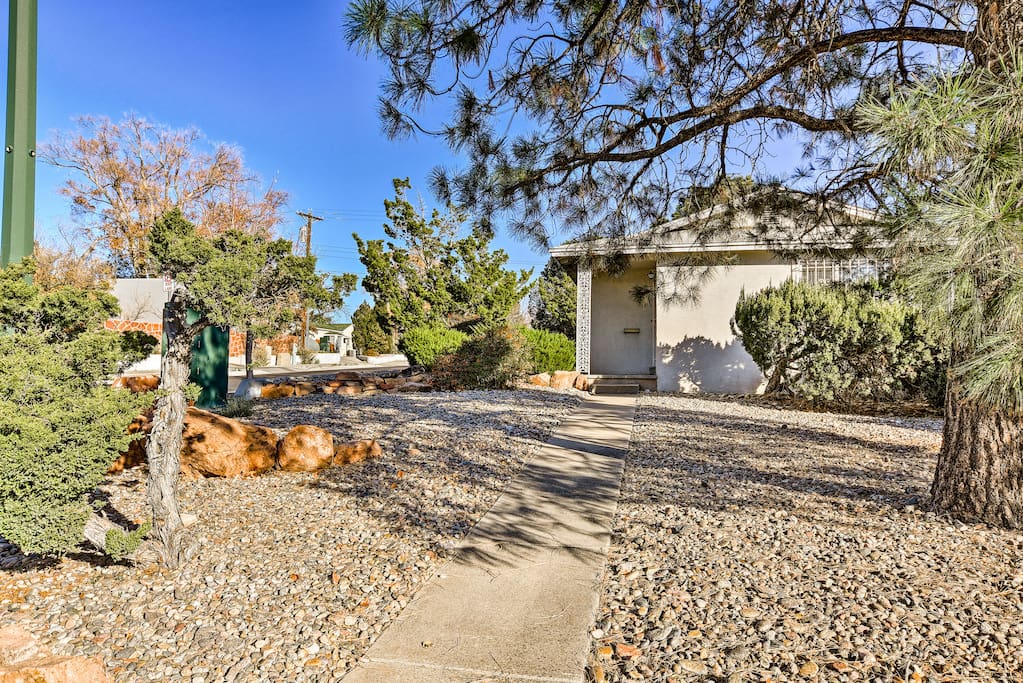 The property's impressive xeriscaping landscaping helps this New Mexico home blend in with the natural landscape.
