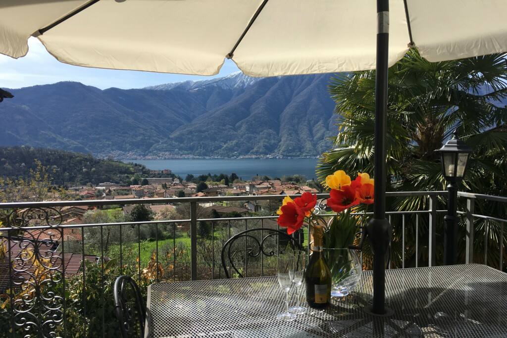 Relax and unwind while enjoying spectacular views over the sparkling crystal blue water of Lake Como and its surrounding mountains.