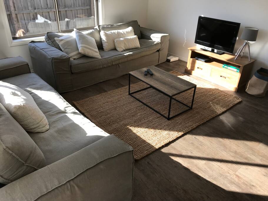 Comfortable open plan living area in the family room.
