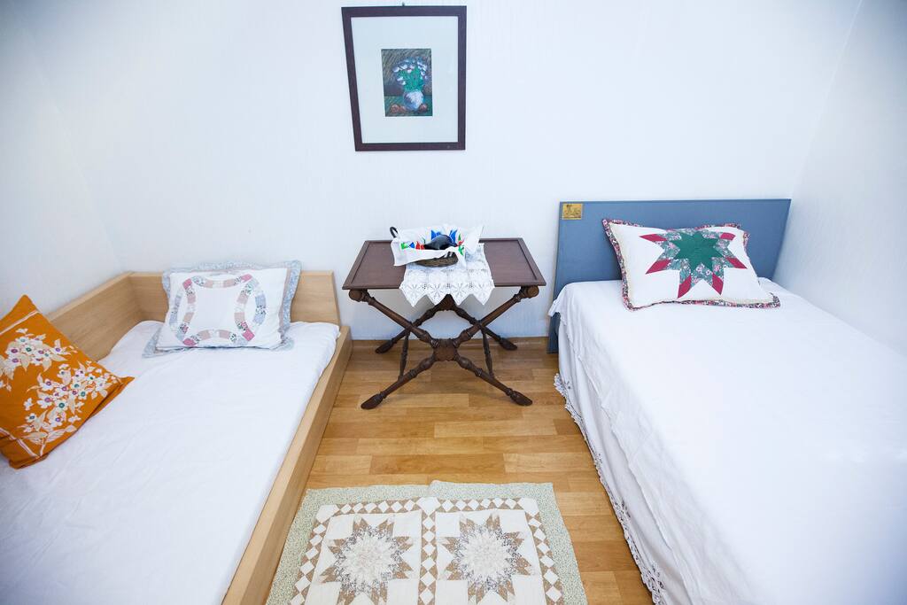 # Room 2 with Two super single bed, cable TV (share the kitchen with Room 3)