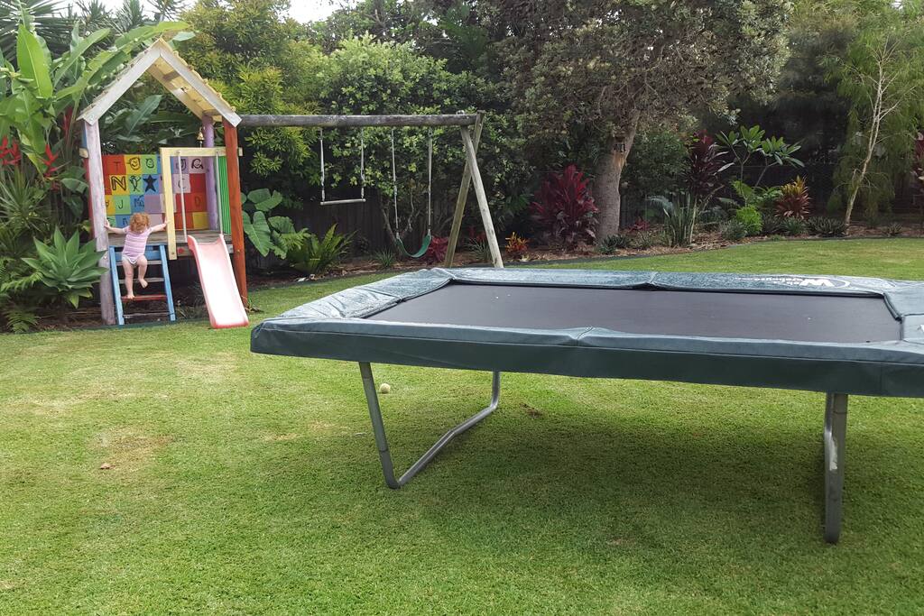 Massive yard, big trampoline, cubby house and swings for the kids!
