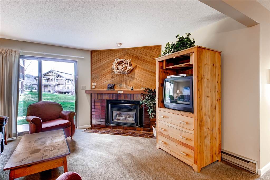 Entertainment Center,Fireplace,Hearth,Chair,Furniture