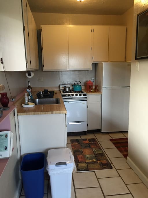 Enjoy home cooked meals in this equipped kitchen. Coffee included.