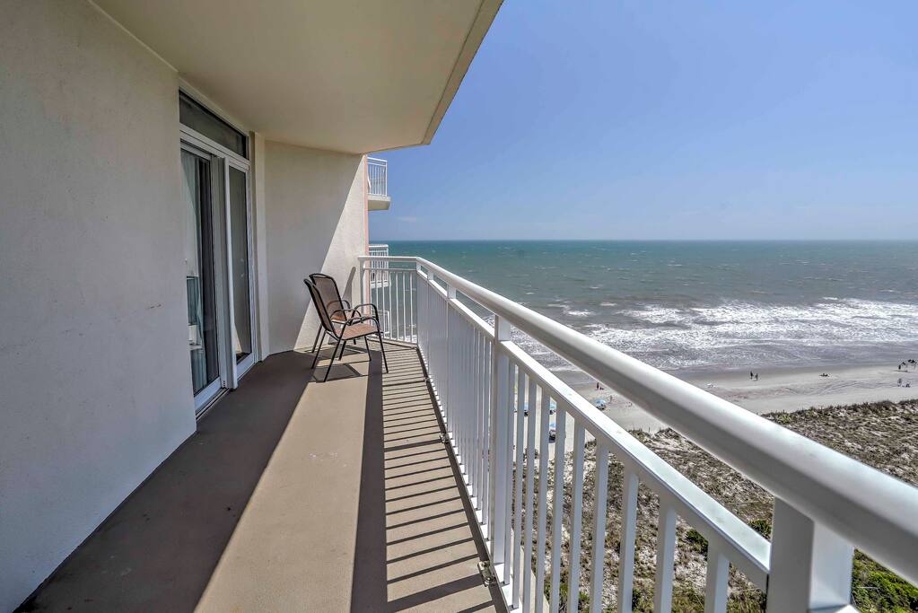 Rest easy on the private balcony that overlooks the sparkling ocean and bright white sand.