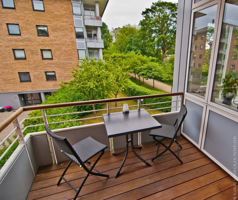 Balcony with view over the lake park and private gardens