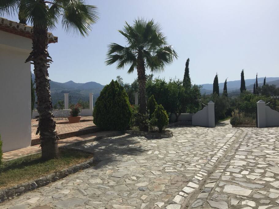 Looking back at the front gate and private driveway.
