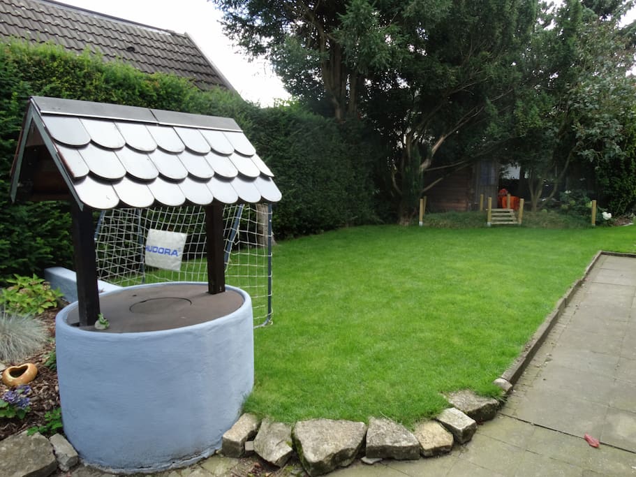 Wishing well with lawn