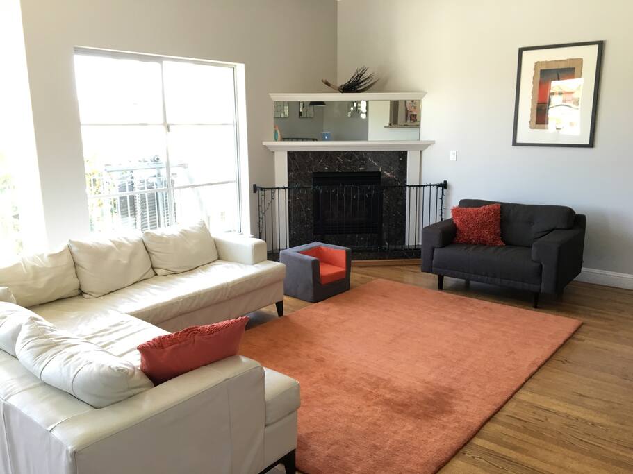 Our HUGE living room is perfect for lounging and entertaining guests.