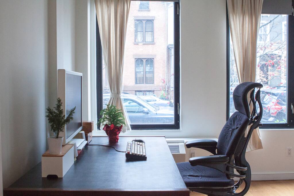 This desk is huge and comfortable. If you need to get any work done (or watch netflix and play music), this spot comes in handy.