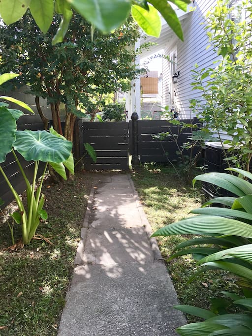 Through the greenery that is New Orleans and you will find your gate.
