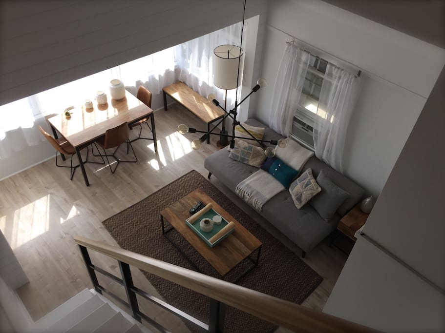 VIEW OF LIVING ROOM FROM LOFT