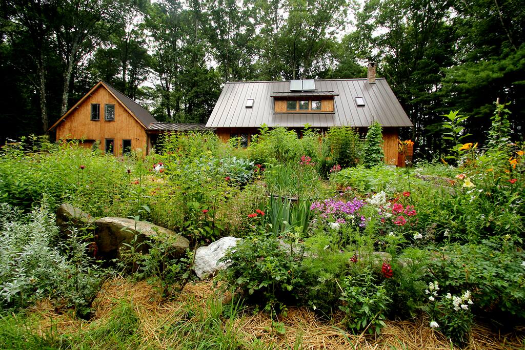 View of property with gardens
