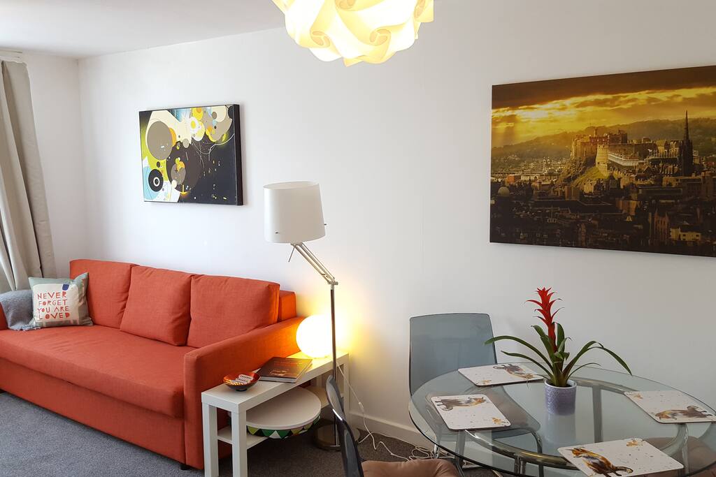 Bright and sunny south-facing living room with comfy brand new sofa bed for additional guests
