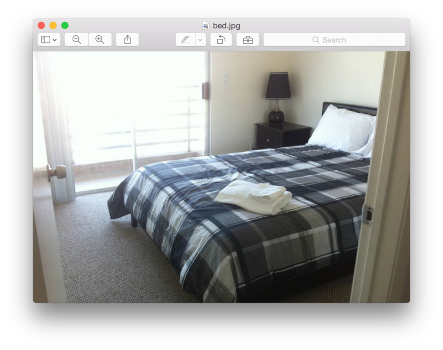 Comfy queen bed with nice linens, closet, balcony, clean and cozy