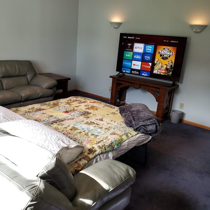 Relax in the back room!  This was Al's favorite room where he would kick back and watch TV!  Kick back on the Queen sleeper sofa and binge your favorite shows!  