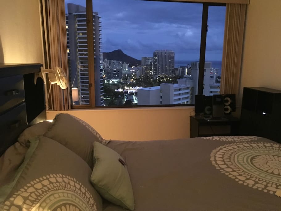 The spectacular view from your bedroom of the romantic sunset of Waikiki and ....Diamond Head