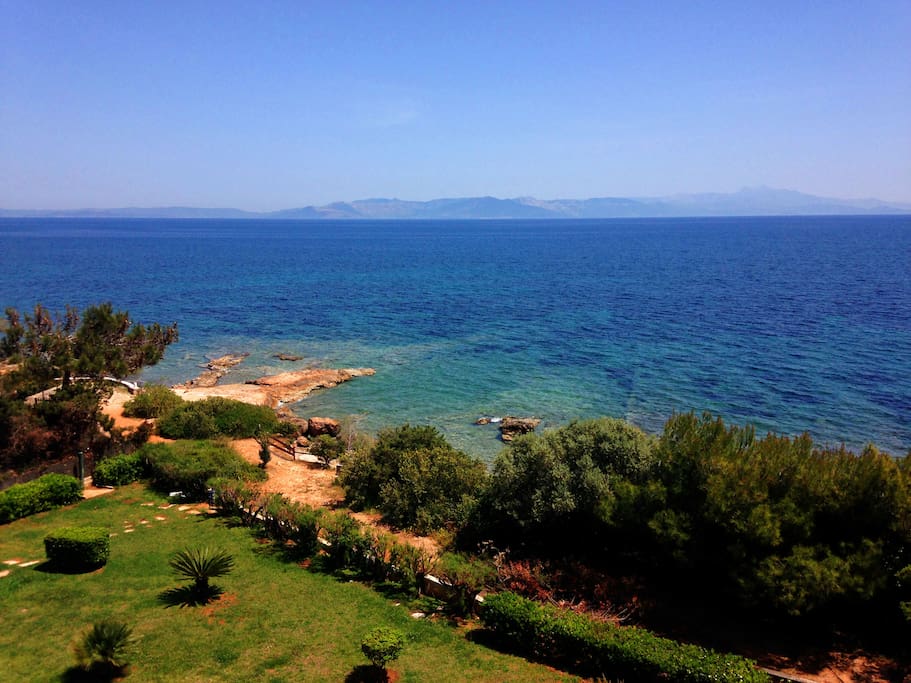 view from balcony to beach front and beach path