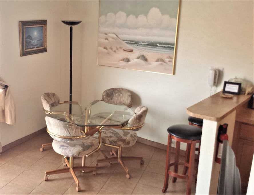 Glass top dining table & 4 chairs