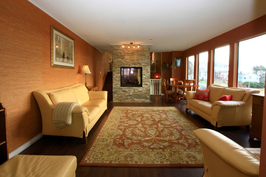 In our living space you can enjoy a see-through fireplace