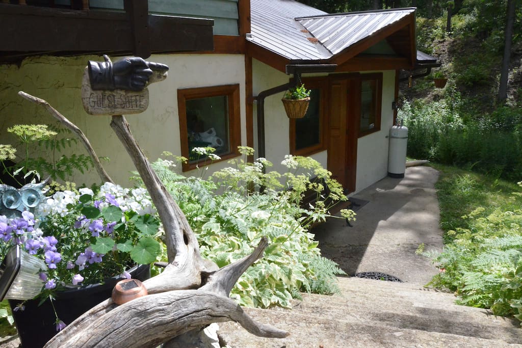 Steps down to the suite and front patio. Private entrance.