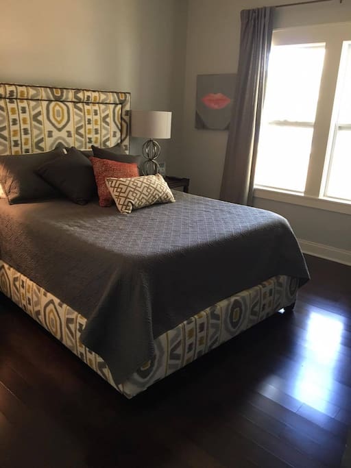immaculate guest bedroom with flat screen TV for maximum chill.
